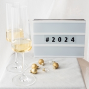 photo of champagne glasses and 2024 numerals
