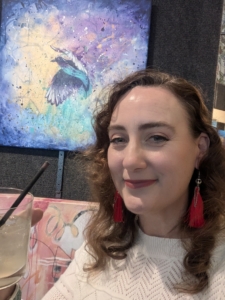Bethany Maines at the Federal Way Arts Explosion as she gets side track by art