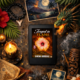 A kindle with the cover of Forged in Flame lays among a variety of Hawaiian themed objects